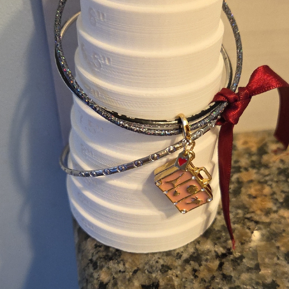 Elegant Silver and Black Charm Bracelets